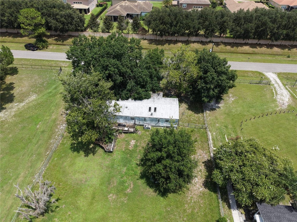 Photo of 18440 Amityville Dr, Orlando, FL 32820 (MLS # O6426633)