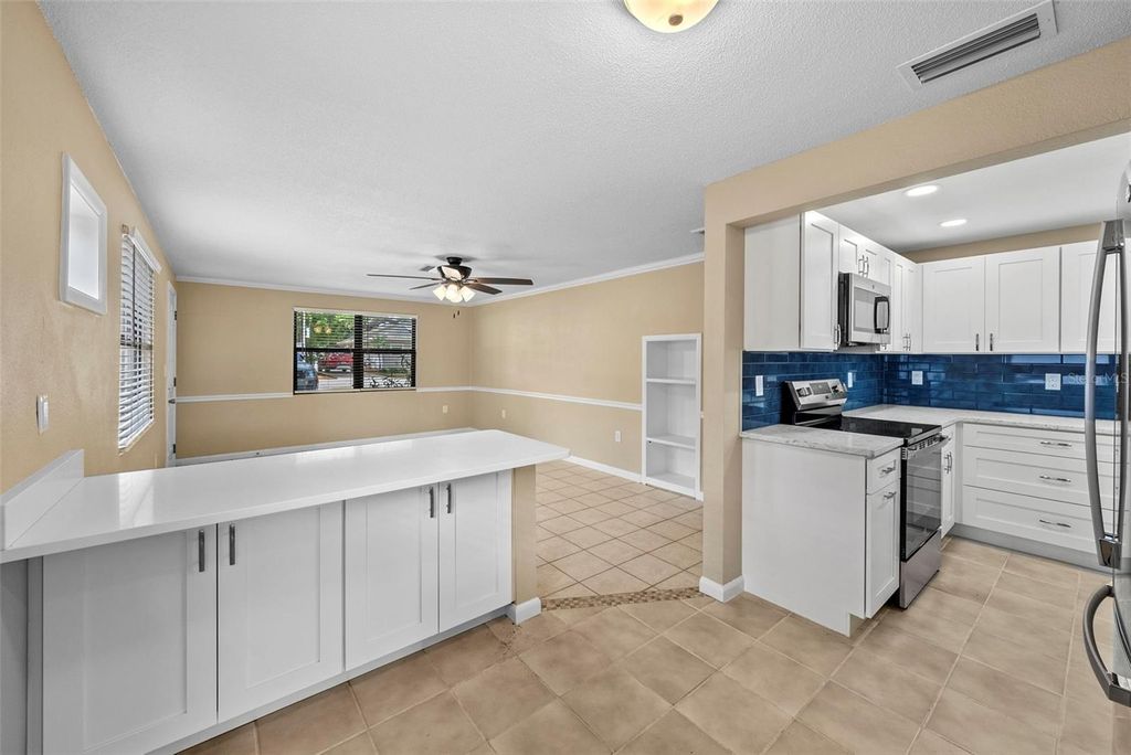 Photo of 1193 Bass Boulevard, Dunedin, FL 34698 (MLS # TB8491866)