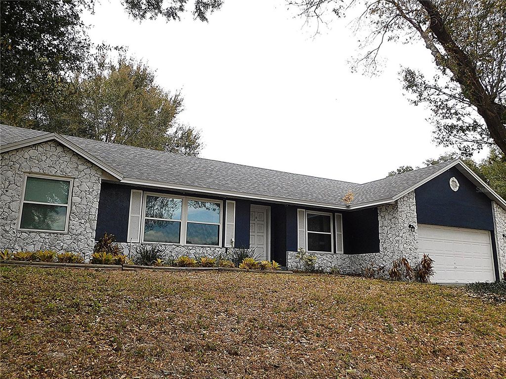 Photo of 979 Red Dandy Drive, Orlando, FL 32818 (MLS # O6382188)