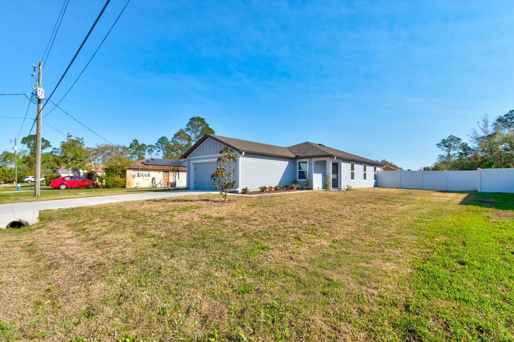 Photo of 33 Pine Croft Lane, Palm Coast, FL 32164 (MLS # FC317057)