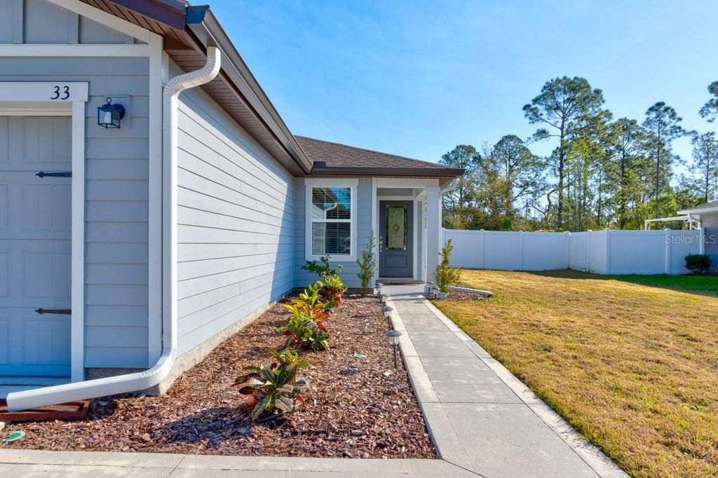 Photo of 33 Pine Croft Lane, Palm Coast, FL 32164 (MLS # FC317057)