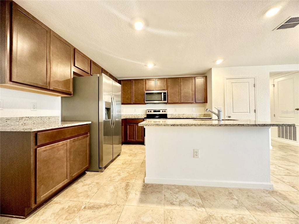 Photo of 5632 Maddie Drive, Haines City, FL 33844 (MLS # S5158124)