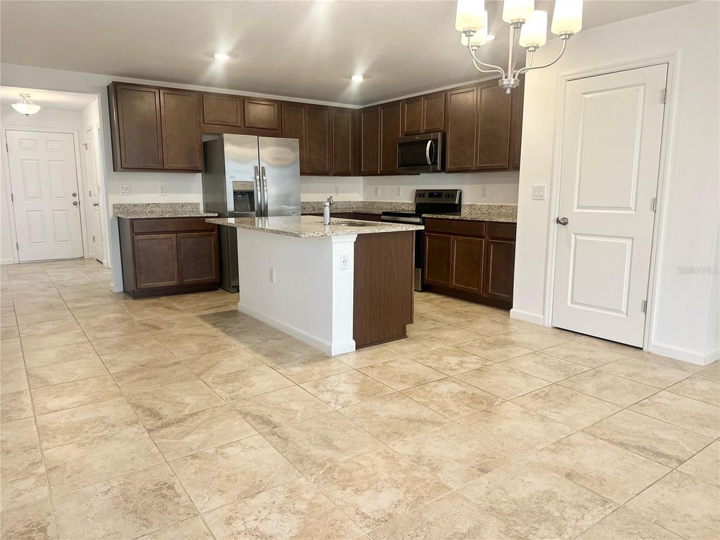 Photo of 5632 Maddie Drive, Haines City, FL 33844 (MLS # S5158124)