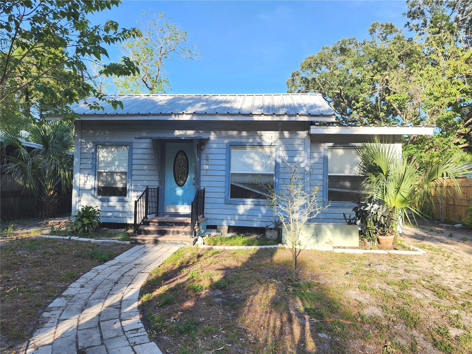 A quaint bungalow home in Sulphur Springs features a 2 bedrooms split layout with laminate floors throughout, 1 bath, a formal living room with a decor fireplace, and a dedicated dining room, the living space has heigh ceilings and a wood beam. There is a studio apartment in the back of the house that can be rented also if another bed and bath is needed.