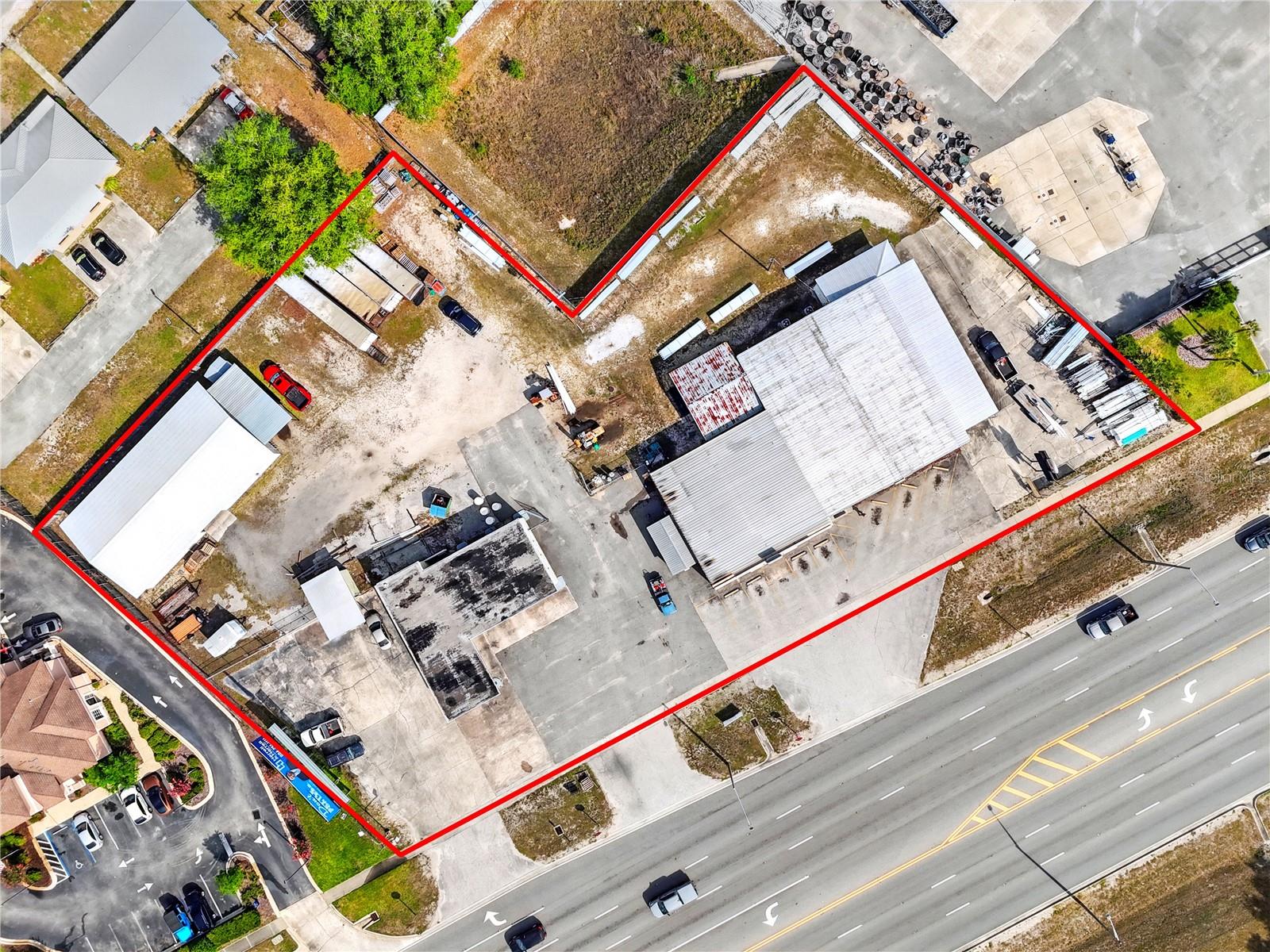 High-Visibility Redevelopment Opportunity – 1.61 Acres in Growing Palatka Market
Presenting a premier commercial offering in Palatka, Florida—spanning 1.61 acres across three contiguous parcels. Strategically positioned at the high-traffic intersection of State Road 19 and St. Johns Avenue, this property boasts exceptional visibility and significant redevelopment potential in one of Putnam County’s fastest-growing areas.
Parcel 1 features a 0.93-acre lot improved, zoned C-4 Commercial Intensive, with a 7,918 sq ft retail building operating as a plumbing and electrical supply business. The structure includes a large reception area, three offices, two bathrooms, a spacious workshop, and ample storage—ideal for retail or showroom use. The lot has a fenced area at the rear housing an additional 2,592 sq ft warehouse with a 420 sq ft canopy.
Parcel 2, located at the rear of Parcel 1, is a 0.18-acre vacant lot with no street frontage. This space adds depth and flexibility to the overall site layout, providing further room for outdoor storage, expansion, or potential redevelopment.
Parcel 3, at 108 N State Road 19, spans 0.5 acres and includes a former filling station zoned C-2 (Commercial, General Light). This 1,664 sq ft building features large roll-up glass doors, prominent front-facing windows, and a 600 sq ft canopy—ideal for automotive, retail, or service-oriented business uses.
The entire offering presents abundant paved parking, prominent street exposure, and is strategically positioned in one of Palatka’s busiest commercial corridors. The parcels may be purchased together for $3,000,000 or separately, with Parcel 3 offered at $1,250,000 and Parcels 1 & 2 combined at $1,750,000. If re-parceling is desired to achieve a specific size or frontage, the seller will consider with a reasonable offer.
The sale includes real estate only; no business, assets, or equipment will convey. The existing business will vacate upon sale. Owner financing may be considered with a minimum 20% down payment.
This is a rare investment opportunity to acquire a highly visible, versatile commercial property with significant existing infrastructure and substantial upside for redevelopment, expansion, or repurposing.