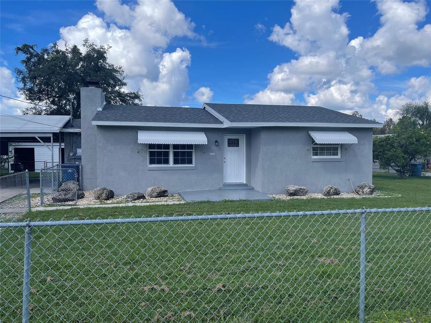 Here's a great opportunity in DeLand! This house sits on just under a 1/4 acre conveniently located close to HWY 92 and I-4 for travel to Daytona/Sanford/Orlando. Current owners have completed some remodeling so come put your finishing touches to make this place your own! This property boasts a very large detached garage/workshop with a huge air compressor for your projects. Well house/storage building is 90% complete. There's also a carport for additional covered parking. The well is less than 5 years old. The large covered back porch also has a built-in bar area perfect for entertaining or just relaxing. Just minutes from historic downtown DeLand for great dining and shopping. This property is great for a first time buyer or investor. Priced to sell, this one won't last long!