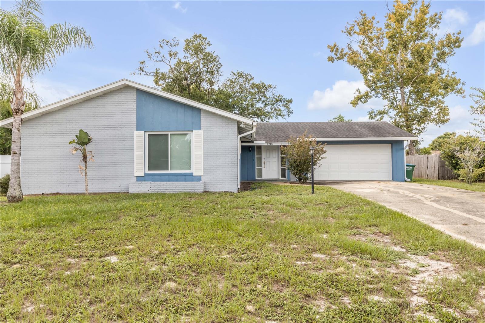 Looking for a Move-In Ready Home in Deltona? Look No Further!
Welcome to 1275 Elkcam Blvd, a charming 3-bedroom, 2-bathroom home nestled in the heart of Deltona! Offering 1,598 sq. ft. of living space, this inviting property boasts extra-large bedrooms with brand-new carpet, fresh interior paint, and plenty of natural light throughout.
The spacious floor plan includes a large living room and dining area, perfect for gatherings, and a bright kitchen with ample cabinet space. Step outside to enjoy the expansive screened-in porch, ideal for relaxing or entertaining, while overlooking the private backyard.
Additional features include:
-New roof installed prior to closing
-Garage with attached storage room – perfect for tools, bikes, or hobbies
-Updated finishes throughout for a truly move-in ready experience
-Split bedroom layout offering privacy for the primary suite
-Convenient location near shopping, schools, and major roadways
This home truly combines comfort, space, and functionality. Don’t miss your chance to make it yours – schedule your private showing today!