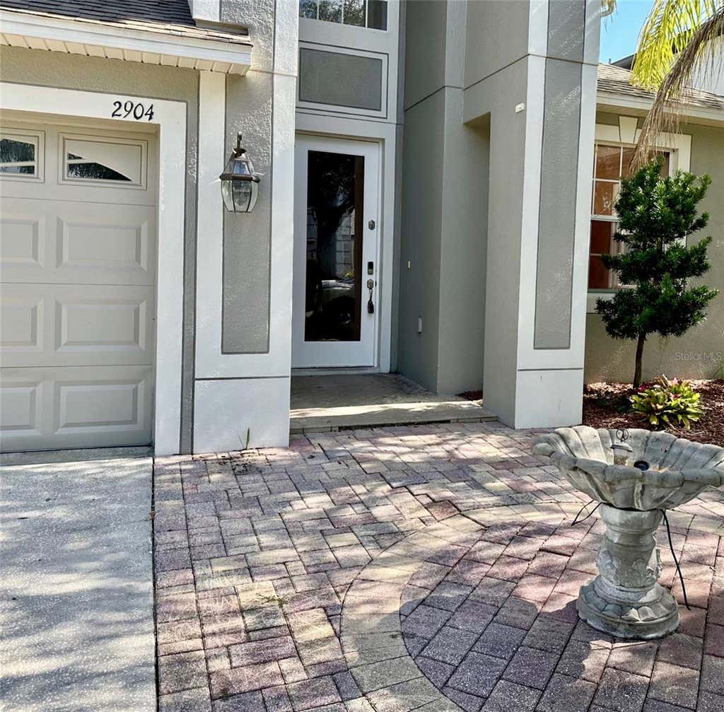 Photo of 2904 Trinity Cottage Drive, Land O Lakes, FL 34638 (MLS # TB8536100)