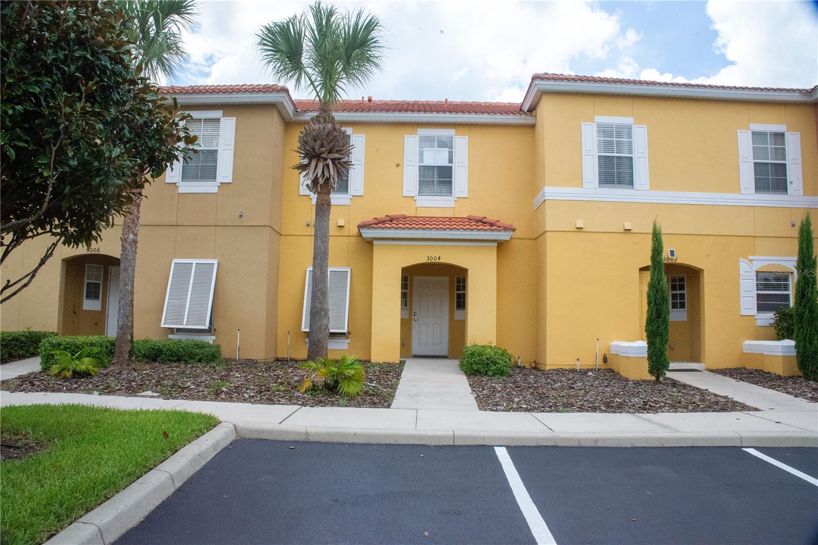 PRICE REDUCED! LOCATION, LOCATION! FULLY FURNISHED (SHORT-TERMS RENTAL) Beautifully 3-bedroom, 2.5-bath townhouse located in the gated Encantada Resort, just minutes from Walt Disney World. Built in 2008, this home offers an open-concept kitchen and living area, plus a private screened-in pool with child safety fence. Perfect as a primary residence, vacation home, or short-term rental investment, it comes with access to resort-style amenities including a clubhouse, two pools, fitness center, lounge, restaurant, and 24-hour security. The HOA covers lawn care, trash, and exterior maintenance. Conveniently close to shopping, dining, entertainment, and major attractions, this property combines comfort, location, and strong rental potential.