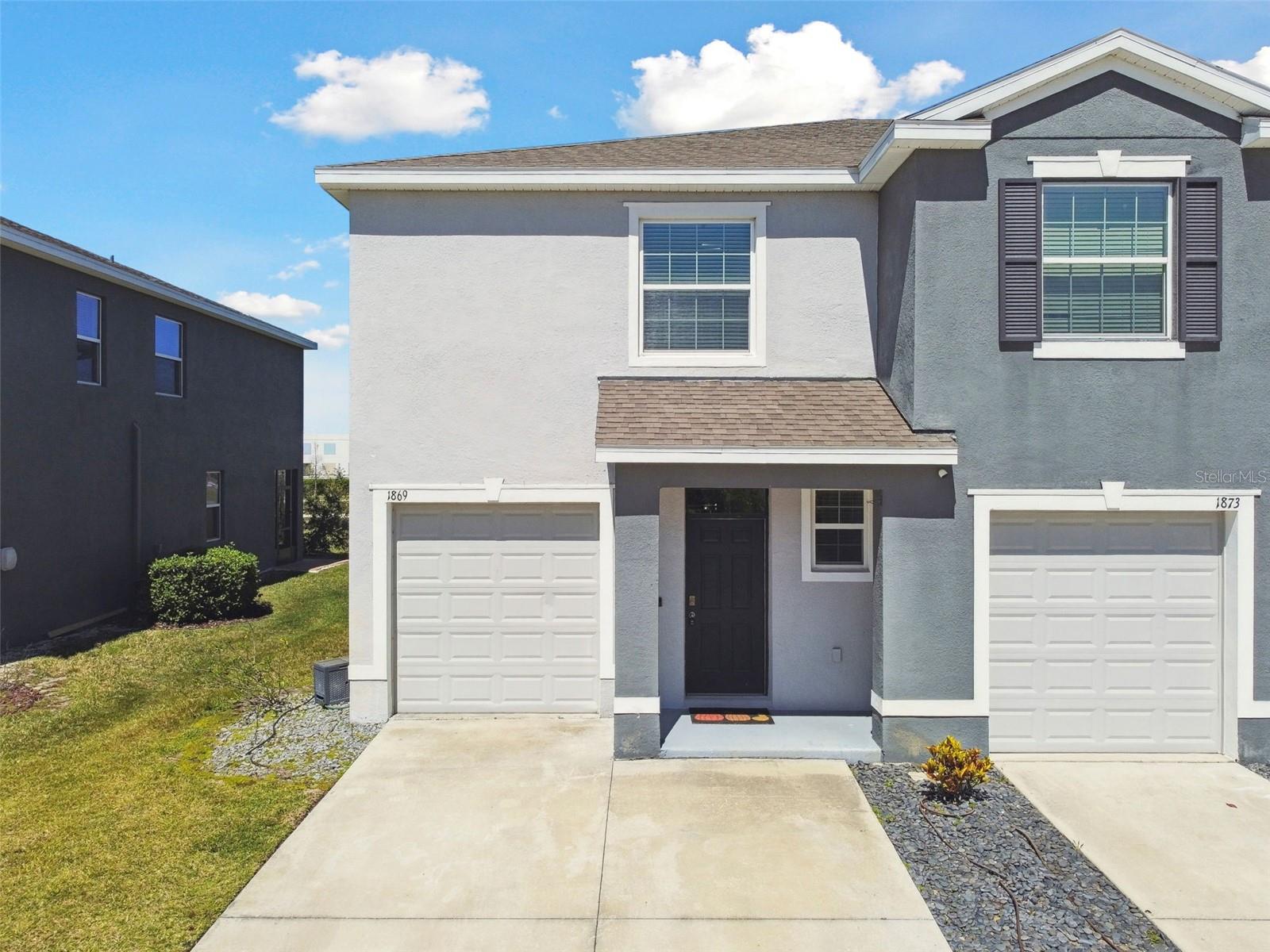 Nestled in a stunning resort-style community, this beautifully designed 3-bedroom, 2.5-bathroom townhome offers both comfort and convenience. With a one-car garage and a two-car-wide driveway, there’s plenty of parking for both homeowners and guests. Step inside to a welcoming foyer that leads into a spacious, open-concept living area. The modern kitchen is a chef’s delight, featuring elegant granite countertops, rich espresso cabinets, sleek appliances, and a walk-in pantry for ample storage. A large sliding glass door opens to the expansive screened lanai, where you can unwind while enjoying serene pond views. Throughout the home, stylish light fixtures and ceiling fans in every room ensure both sophistication and year-round comfort. The open-concept living and dining area is perfect for entertaining or simply relaxing. Upstairs, you’ll find three well-appointed bedrooms and a versatile bonus area—ideal for a home office, playroom, or additional lounge space. The luxurious master suite serves as a private retreat, complete with two walk-in closets and an en-suite bathroom. A convenient second-floor laundry closet adds to the home's functionality. Living in Union Park grants you access to an array of world-class amenities, including a resort-style pool, a heated lap pool, multiple playgrounds, a splash pad, and a dog park. Stay active with a state-of-the-art fitness center, outdoor fitness stations, and a serene Zen garden. The HOA further enhances your lifestyle by covering high-speed internet, cable, lawn care, exterior maintenance, and more. Union Park is an award-winning community that seamlessly blends modern living with leisure. With top-rated schools, shopping, dining, and entertainment just minutes away, this home truly offers the best of both comfort and convenience. A must-see!