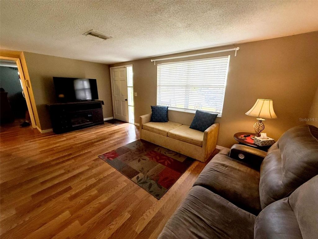 Photo of 9721 Lake Chrise Lane, Port Richey, FL 34668 (MLS # W7884794)