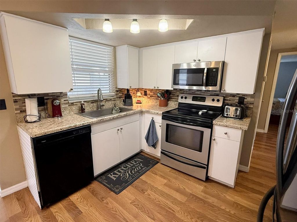 Photo of 9721 Lake Chrise Lane, Port Richey, FL 34668 (MLS # W7884794)