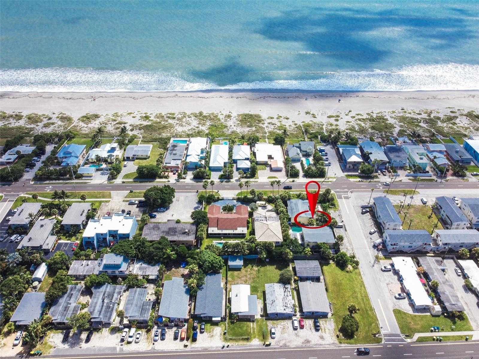 Rare opportunity to own this 8 Unit multifamily property in iconic Cocoa Beach, just 300 feet from the boardwalk and ocean access. Situated on a .34-acre corner lot, this unique property includes two quadplex buildings centered around a saltwater pool and surrounded by tropical landscaping. Operating as ''Sea Esta'' almost 40 years, this property offers a boutique-style experience, providing an alternative to high-rise hotels and crowded resorts. Ideal for investors, vacation rental operators, or boutique hotel concepts. One building was updated in 2009 with new electrical panels, windows, sliders, and tankless water heaters. Two new HVAC units installed in 2024. Each unit has its own wooden deck to enjoy. On-site parking, workshop and laundry facilities included. Adjoining vacant lot may also be available for purchase, offering potential for expansion. Own your hospitality! Don't miss this rare income-producing coastal GEM with unbeatable location and long-term upside