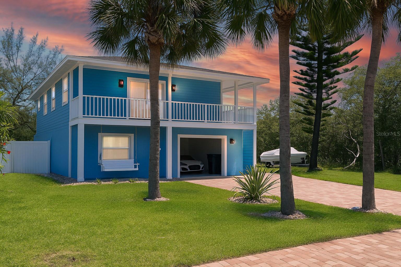 Modern Coastal Hideaway in the Heart of Holmes Beach
Tucked at the end of a quiet street and surrounded by a serene mangrove preserve, this elevated, partially furnished 2-bedroom, 2-bath retreat offers a perfect blend of modern upgrades and total privacy—just 3 minutes to the sugar-white sand beach and only 400 yards from local shops, dining, Publix, and island essentials. The home underwent a 7-month renovation in 2023–2024, bringing a light-filled open layout, all-new granite countertops, white shaker cabinetry with under-cabinet lighting, and stylishly remodeled bathrooms. The home is equipped with all-new electrical wiring and panel, underground power line, and modern smooth ceilings (no popcorn!), along with a whole-house water filtration system and a reverse osmosis tank in the kitchen. Enjoy the comfort of plantation shutters on every window, a brand-new garage door and opener (2025), and a handicap accessable elevator (750 lb capacity) for easy access and effortless move-ins. Step outside to your private, fenced backyard oasis, where a saltwater pool (2025)—measuring 11’ x 26’, built with an 18" elevation, and featuring a built-in jacuzzi/spa and mobile pool alarm—invites you to relax and unwind. Enjoy privacy and mangrove views from the Primary suite, which includes a walk-in closet and an ensuite bath. The landscaping includes lavender bushes and two orange trees, adding natural beauty to your peaceful setting. Downstairs, a 2-car tandem garage and 480 sq ft bonus room with polyaspartic-coated concrete flooring offer flexible space for a playroom, gym, studio, or office, along with ample storage and an outdoor shower. The guest bedroom includes a built-in premium closet organizer, and the living room closet is located in the hallway. Flooring throughout includes laminate in the bedrooms, living and dining rooms, tile in the kitchen and bathrooms, and concrete with polyaspartic coating in the bonus space. With zoning that allows monthly vacation rentals, strong rental potential, and a location just minutes from the Manatee Bridge and the Bridge Street Historic District in Bradenton Beach, this entirely renovated and remodeled Holmes Beach gem is truly a rare find.