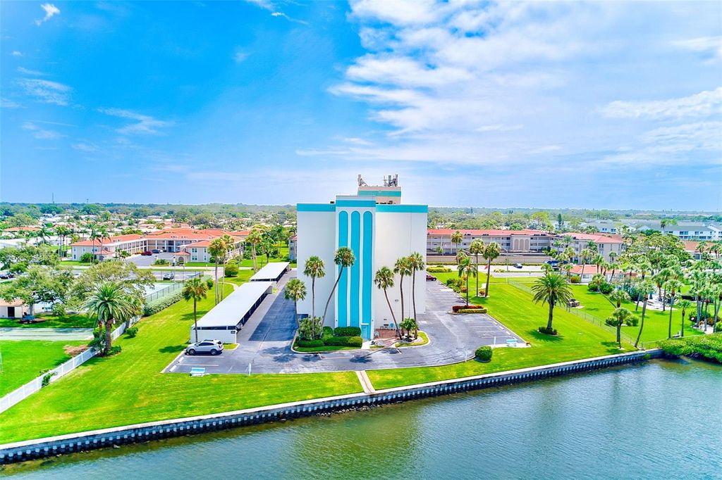 Photo of 10216 Regal Drive #705, Largo, FL 33774 (MLS # TB8429668)