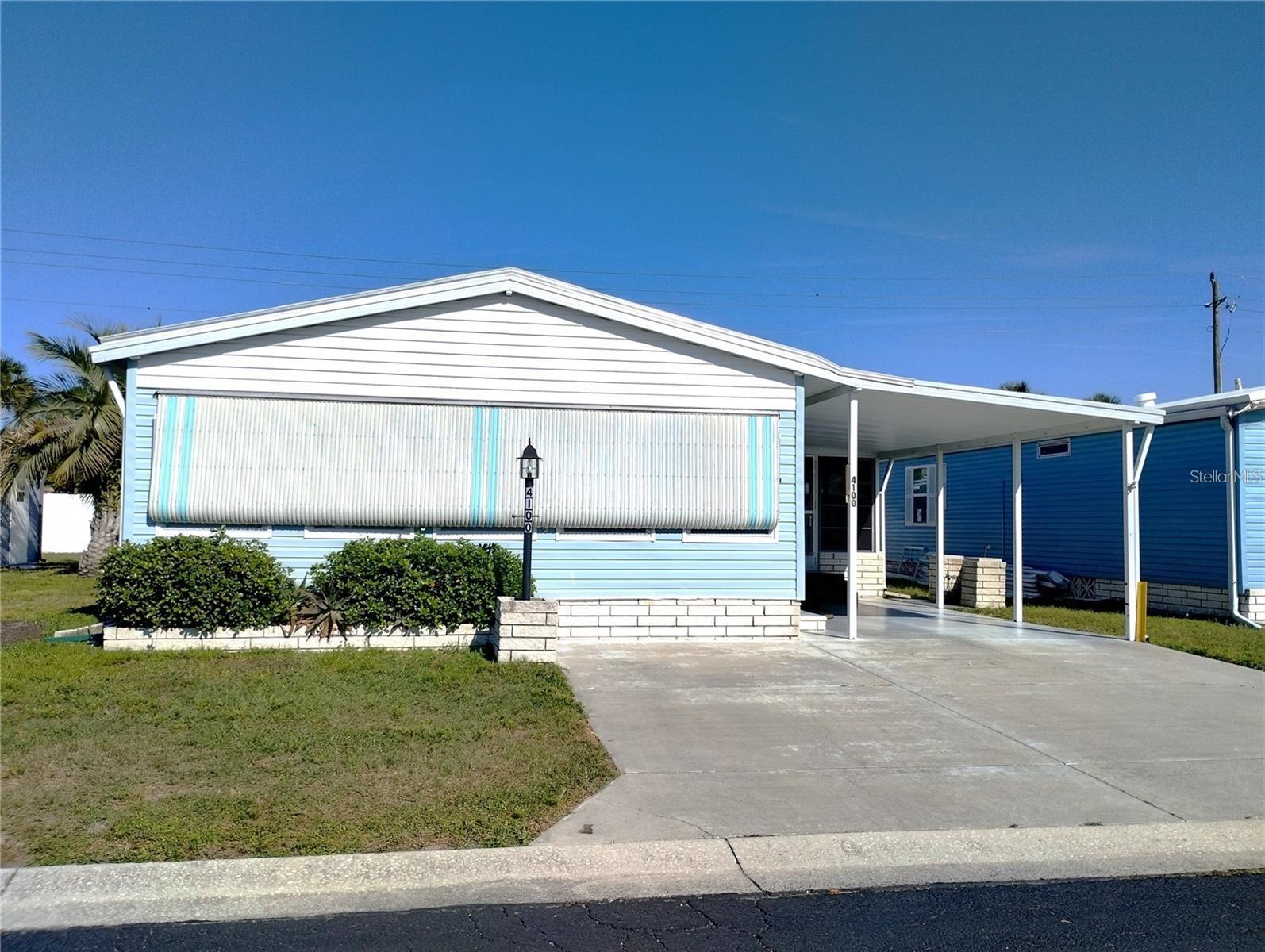 Discover this spacious 1991 DWMH in a vibrant 55+ community with a low monthly fee! Recently upgraded with brand NEW 3-Ton CH&A system installed in January 2025 and NEW Whole House Plumbing completed in March 2025, this home is ready to impress. It features an expansive Florida room, accessible from both the inside of the home and outside via steps or a convenient ramp. The possibilities here are endless! Its time to call this home your own!