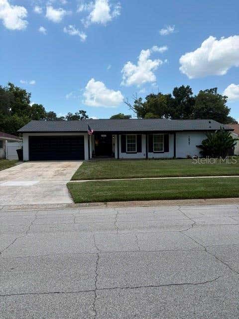 Photo of 1921 Winnebago Trail, Casselberry, FL 32730 (MLS # O6427261)
