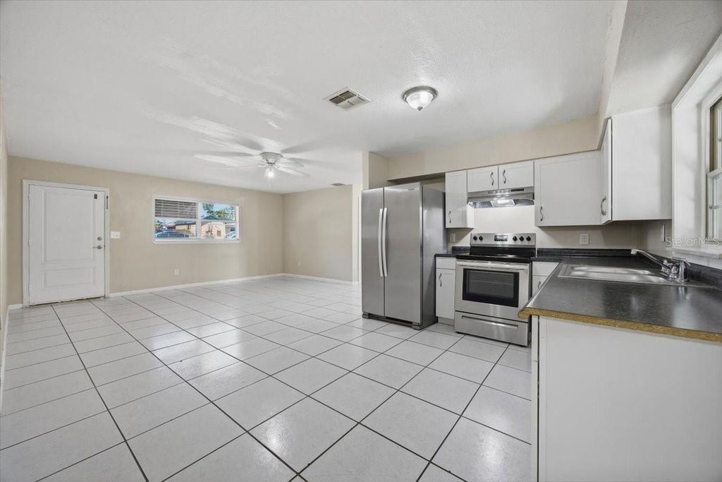 Photo of 113 N Lancelot Avenue, Orlando, FL 32835 (MLS # O6372717)