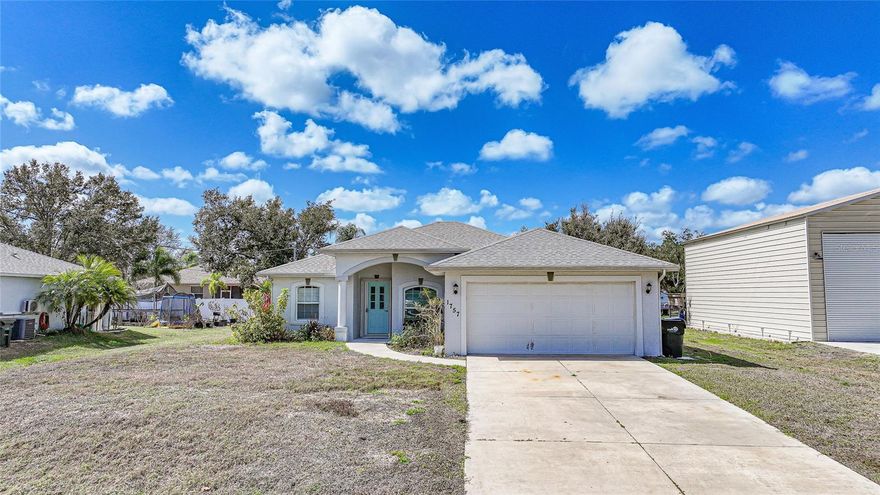 Welcome to your Florida retreat in the heart of North Port! This 3-bedroom, 2-bathroom 2 car garage home offers 2,031 square feet of thoughtfully designed living space with a desirable split-bedroom floor plan that blends comfort, style, and functionality. From the moment you arrive, the inviting front patio, covered entry, and spacious front yard set the tone—offering a blank canvas to personalize the landscaping and enhance the home’s curb appeal. A two-car garage provides both convenience and ample storage. Step inside to discover a bright, open layout designed for both everyday living and effortless entertaining. Tile flooring flows throughout the home’s main living areas, offering durability, easy maintenance, and a clean, cohesive look. The open floor plan creates a natural flow between spaces, while the split-bedroom design ensures privacy for family and guests. Sliding glass doors off the living area lead to the lanai, creating seamless indoor-outdoor living and allowing natural light to fill the space. At the heart of the home, the modern kitchen features crisp white hardwood cabinetry, stainless steel appliances, a breakfast bar, pantry closet, and overlooks the main living area. With open sightlines to the dining and living spaces, the kitchen serves as a true gathering place for the home. Just off the kitchen, a convenient laundry room with additional storage keeps everyday tasks organized and out of sight. The owner’s suite serves as a private retreat with direct access to the lanai for easy indoor-outdoor living. The ensuite bathroom features an extended single-sink vanity with ample storage and a spacious walk-in shower. Guest bedrooms are generously sized, each with built-in closets. The full guest bathroom also includes a door leading to the lanai, providing convenient access for outdoor living and offering the flexibility to serve as a future pool bath if a pool is added. The large backyard provides plenty of space to create your own outdoor oasis—whether you envision adding a pool, creating a garden, or designing the perfect space for relaxing and entertaining. Additional updates include a new roof in 2024 and a new A/C in 2023, and the home is equipped with hurricane shutters for added protection and peace of mind. The home is just five minutes from Murdock Circle, offering convenient access to shopping, dining, major retailers, the mall, and a variety of local restaurants. The Gulf beaches are approximately 25 minutes away, while Centennial Park’s Olympic-size swimming pool is only 10 minutes from the home. Charlotte Sports Park, the county fairgrounds, numerous parks, and multiple boat launches are all within a 15-minute drive, making it easy to enjoy the very best of Southwest Florida living.
**PLEASE ENJOY THE 3D INTERACTIVE VIRTUAL TOUR ASSOCIATED WITH THIS LISTING**