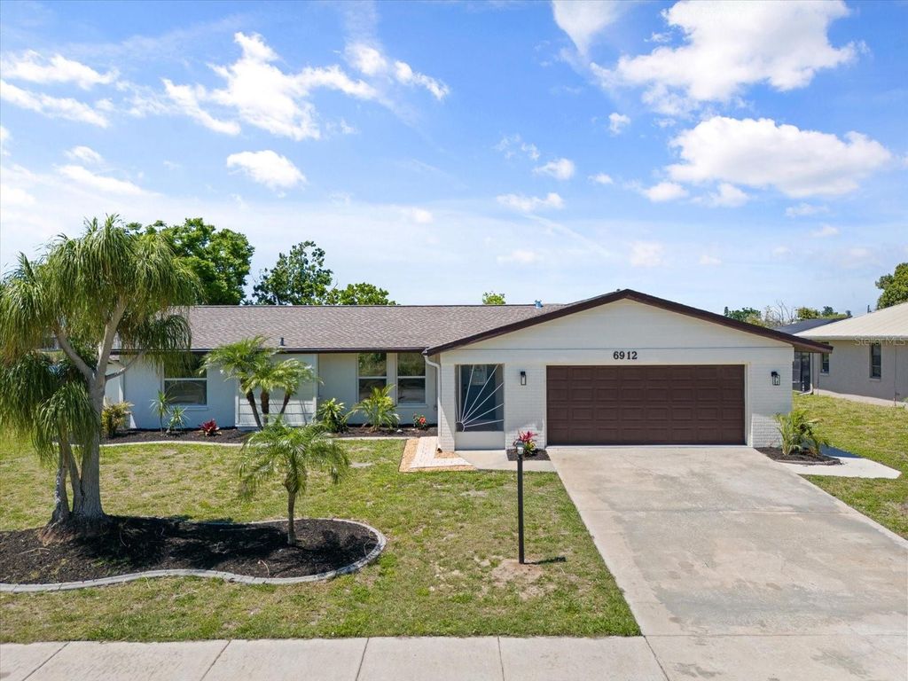 Photo of 6912 Kenwood Drive, North Port, FL 34287 (MLS # A4666358)