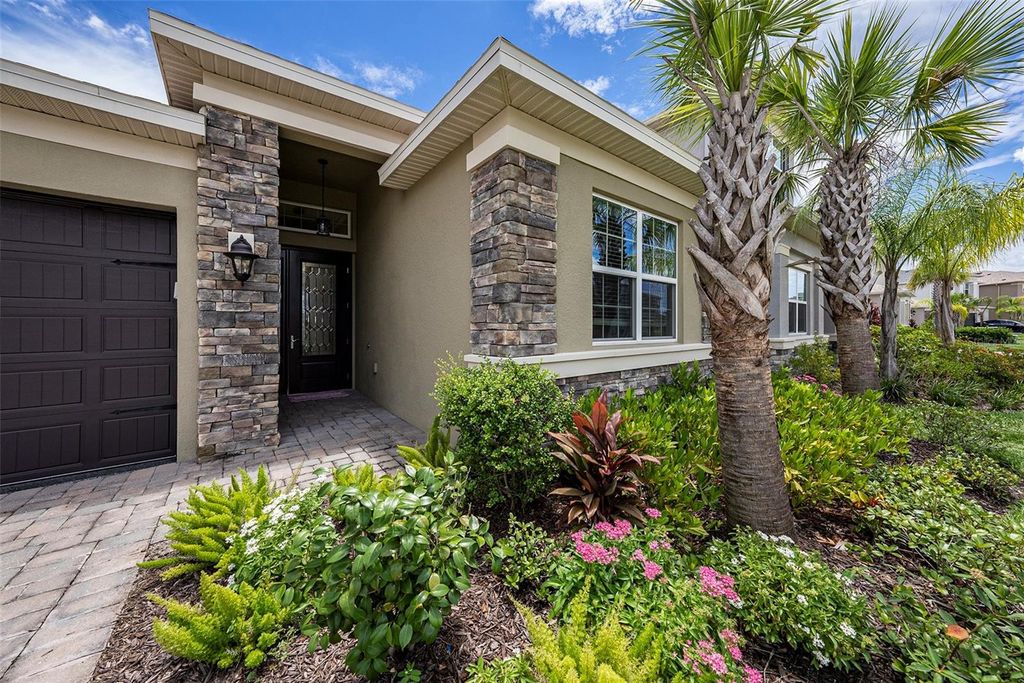 Photo of 3318 Woodland Brook Way, Wesley Chapel, FL 33543 (MLS # TB8395042)