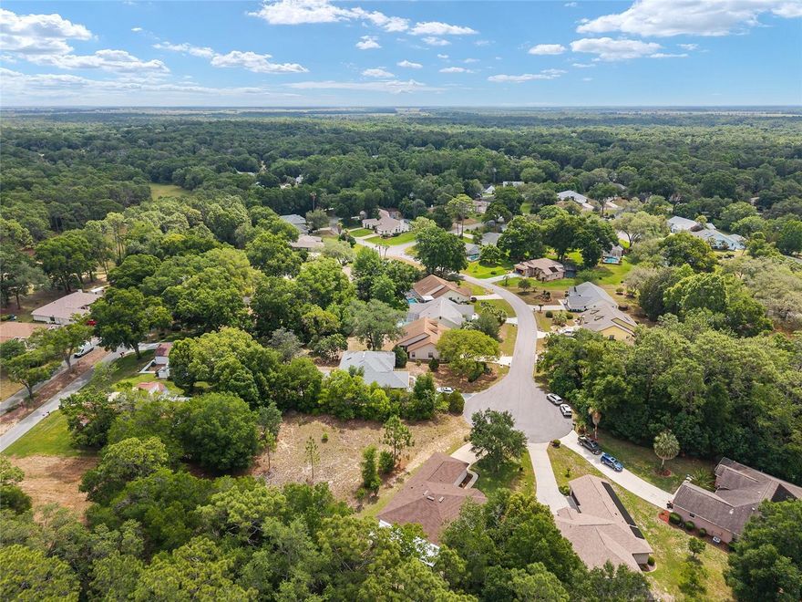 Welcome to this beautifully updated home in the Rainbow Springs Country Club Estates — a true standout that will leave you doing a double-take.  This charming 3/2/2 home has been transformed from top to bottom with a level of care and quality that is genuinely rare. From the moment you step inside, the upgrades speak for themselves: brand-new luxury vinyl plank flooring flows seamlessly throughout, complemented by fresh lighting fixtures and hardware at every turn. The kitchen has granite countertops and a new refrigerator, while the bathrooms have been elevated with quartz countertops, new mirrors, updated hardware, and refreshed lighting.  Elegant wainscoting adds a polished, custom touch throughout the main living areas, giving the home a warmth and character that photographs simply can't capture.
For peace of mind, the big-ticket items are already done, like a new roof and HVAC system (2024), a new water heater (2025), and an active termite bond, making this home as worry-free as it is beautiful. Bonus!! The current owners installed a mini-split unit in the garage in 2024 for year-round tinkering comfort! Tucked into the sought-after Rainbow Springs Country Club Estates, you'll enjoy private Rainbow River access through the community park, your personal gateway to one of Florida's most beloved natural treasures. And when you're ready to venture further, you're just minutes from Rainbow Springs State Park, downtown Dunnellon's restaurants, shops, and local charm. Day trips are a breeze with Ocala, Crystal River, and Inverness all within easy reach for additional dining, springs, and nature adventures. When the big city calls, Gainesville, Tampa, and Orlando are all within comfortable driving distance — whether it's a night out, an international flight, a theme park weekend, or a day at the beach.  The Rainbow River isn't just a waterway — it's a lifestyle. Crystal-clear, 68-degree spring water, lazy tubing afternoons, kayaks gliding past cypress trees, and the kind of natural beauty that reminds you exactly why you chose Florida. This is the River life, and it's waiting for you.