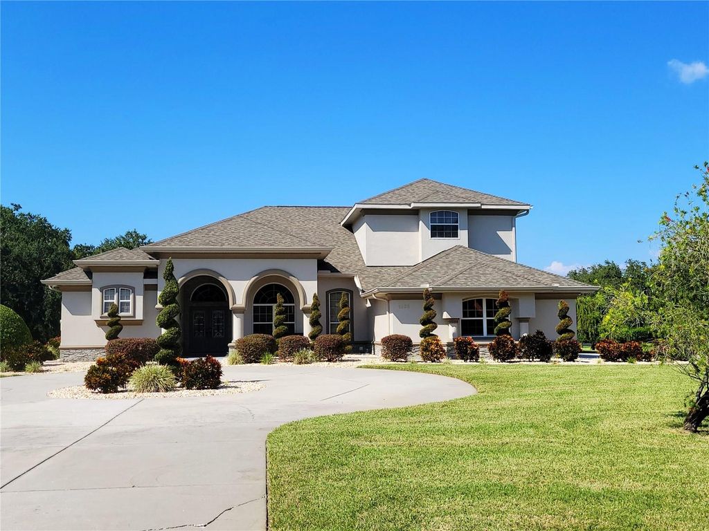 Photo of 1235 Oak Meadow Point, New Port Richey, FL 34655 (MLS # TB8439166)