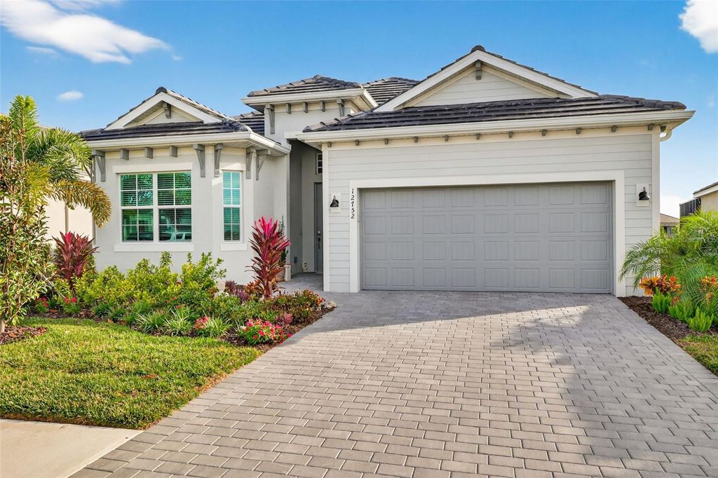 Photo of 12752 Tulum Loop, Venice, FL 34293 (MLS # N6141992)