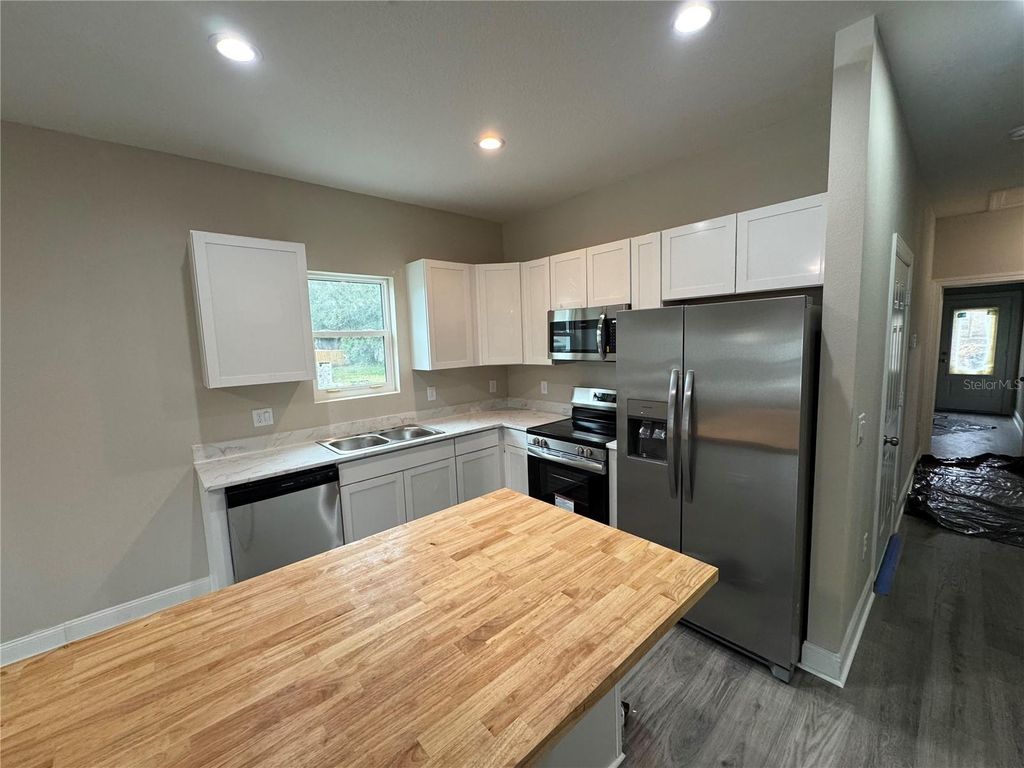 Photo of 3815 Valley Tree Drive, Tampa, FL 33610 (MLS # TB8465224)