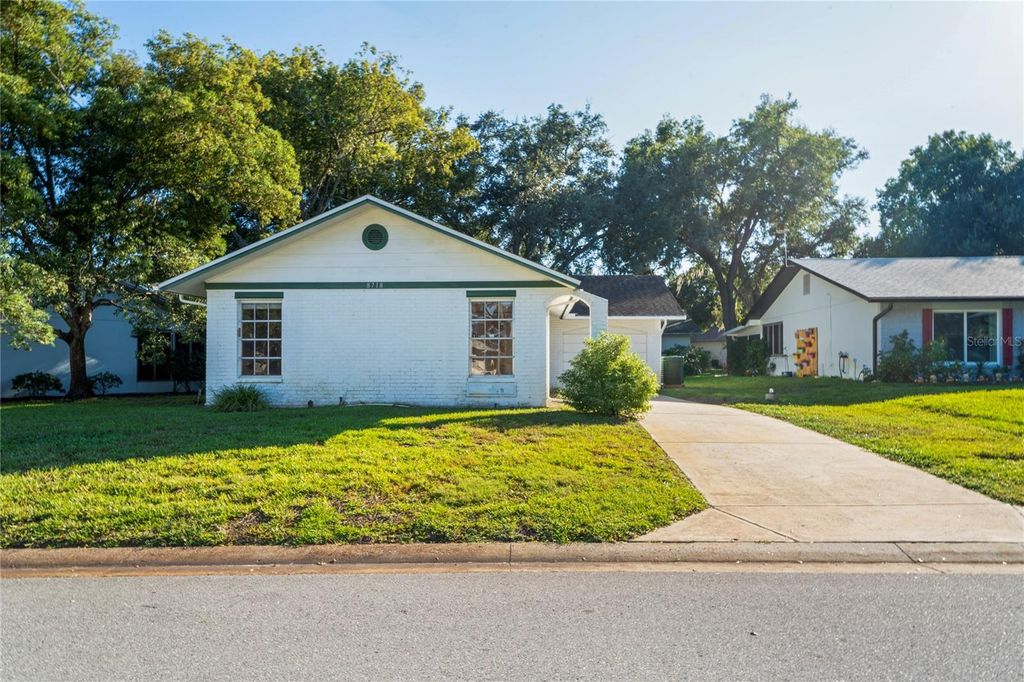 Photo of 8718 Benton Drive, Port Richey, FL 34668 (MLS # W7879940)