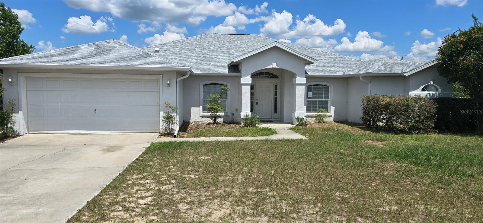 Spacious 4 bed, 3 bath home in Kingsland Country Estates. Tile flooring throughout the home. Separate dining area and office in front of home. 2 great rooms on either side of kitchen. Screened patio in back of home, with access from primary bedroom. Minutes from SR 200 and I-75.