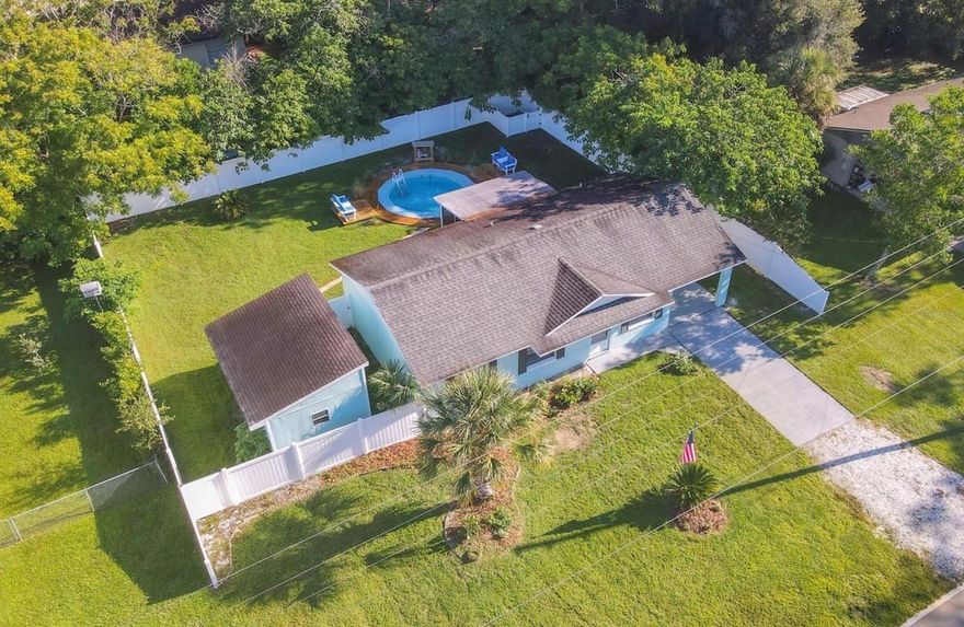 This turn key pool home is ready for a new owner to move in! Located on nearly 1/4 acre within the city of Lake Helen. Just 1.2 miles from I-4 & 4.1 miles from Starbucks, Publix, shops & restaurants, offering the convenience of being close to amenities with the small-town charm of "the Gem of Florida". Wood tone laminate wood flooring throughout and ceramic tile in the dining room and kitchen. The kitchen and dining room are open to each other with new sliding glass doors offering access to the screened back patio and pool. The recently renovated kitchen is light and bright with new shaker style cabinets, new countertops, stainless sink, and gold tone plumbing fixtures and hardware. Enjoy afternoons on the back screened porch overlooking the pool and patio deck, a great spot for entertaining, with a vinyl privacy fence surrounding the entire back yard. There's a detached workshop with electric too! The bathroom has been remodeled and updated with new tile flooring, bathroom vanity, new plumbing and light fixtures. The laundry room has new shaker cabinets for additional storage & is located just off the carport and dining room making it a great "mud room" for owners' entry. One car carport attached for covered parking and a driveway for additional parking. There's also room on the side yard for boat or RV parking. Updated electric throughout, a brand-new electric panel and new water heater. No HOA! Schedule your showing today! Recent home inspection & septic report available showing no major concerns. Contact your agent for a showing. ;Water: City