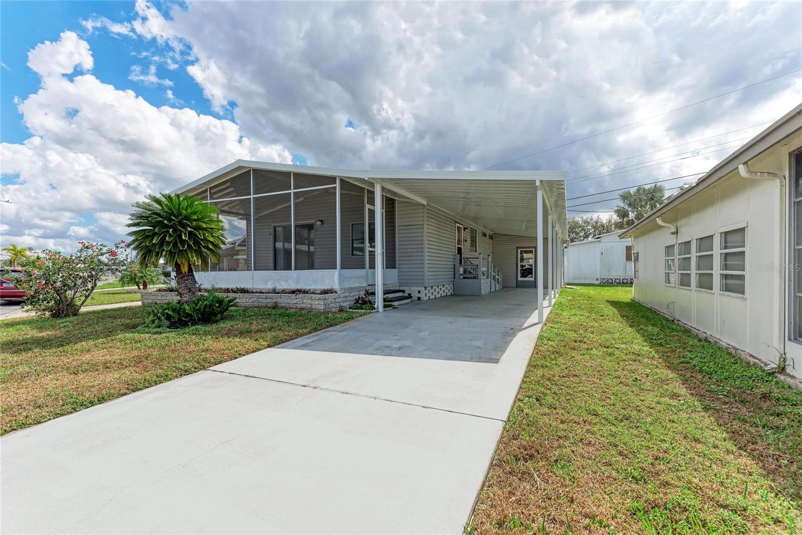 SELLER FINANCING! Charming 2-Bed, 2-Bath Home on a Spacious Corner Lot in Leisure Lake Co-Op (55+ Community)! This home was not water damaged by the hurricanes!
Welcome to easy living in Leisure Lake Co-Op, a sought-after 55+ community where comfort meets an active lifestyle! This beautifully maintained 1989-built home sits on a prime lot with fantastic curb appeal, manicured landscaping, and a welcoming exterior.
Step inside to find a bright, open floor plan with stylish luxury vinyl plank flooring, and modern finishes throughout. The chef’s kitchen, thoughtfully updated in 2025 features granite countertops, a large island, soft-close cabinetry, pull-out drawers, and a pantry—perfect for extra storage.
The owner’s suite is a serene retreat with large windows, an en suite bathroom with dual sinks, a private commode and shower, built-in cabinets, and a walk-in closet. A spacious guest bedroom and a versatile den provide extra comfort and functionality.
Enjoy added convenience with an attached shed for extra storage, a brand new oversized carport, and a 2020 roof.
Leisure Lake Co-Op offers a clubhouse, a pool, fitness center, pickleball, shuffleboard, a library, and a packed social calendar with activities like dances, classes, and group trips. Plus, you're just minutes from Gulf beaches, top restaurants, shopping, and major airports.
This move-in-ready home won’t last long—schedule your showing today! *Owner is also a real estate agent.