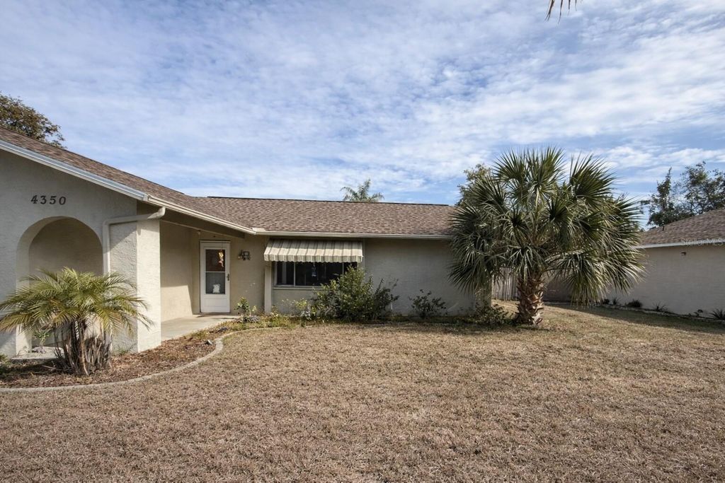 Photo of 4350 Merchant Avenue, Spring Hill, FL 34608 (MLS # A4680390)