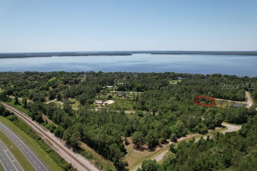 BRING ALL OFFERS! 1-+ acre buildable LOTS! Discover the epitome of Florida living on this vacant lot just moments from the shores of Lake Lochloosa. Home to some of the best fishing in Florida and so much more... Positioned mere minutes from Gainesville, home to the esteemed University of Florida, and within easy reach of Ocala, this parcel of land offers both convenience and tranquility. Other lots for sale. Please reach out for a VIP tour or for more details.