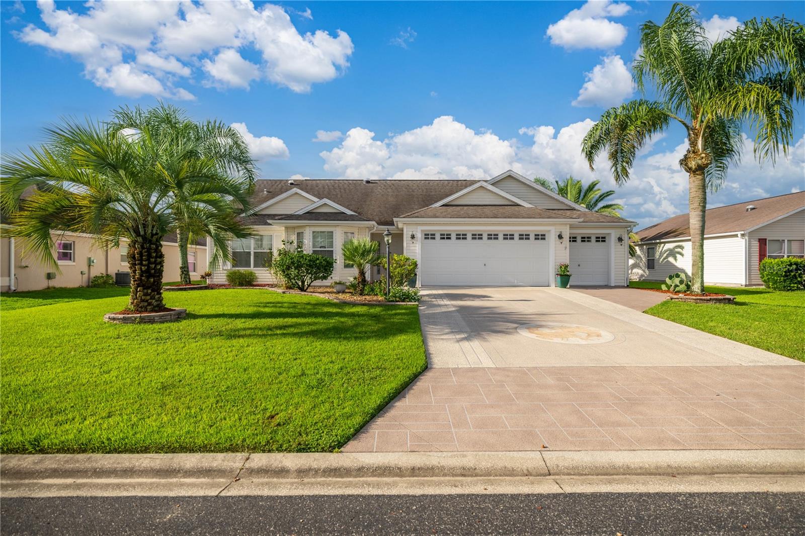 Welcome to BISON VALLEY — A Charming All-Age Golf Cart Community with Access to THE VILLAGES!
Nestled in the heart of convenience and comfort, this beautifully maintained home offers a lifestyle of ease and luxury. Located just minutes from all the amenities that Oxford and The Villages have to offer—including some of The Villages Charter Schools—this home is perfect for both growing families and those seeking an active lifestyle.
Curb Appeal & Florida Living
You’ll be greeted by mature landscaping, a stamped concrete driveway, and elegant palm trees that welcome you to the Florida lifestyle.
Interior Features You'll Love:
Freshly painted interior
Plantation shutters throughout
Vaulted ceilings & arched entryways create an open, airy feel
Ceramic tile and luxury vinyl plank (LVP) flooring—no carpet!
Two solar tubes bring in natural light
Pocket doors in the master suite, guest quarters, and laundry room for added privacy
Bedrooms & Baths
This EXTENDED Whispering Pines model offers 3 spacious bedrooms and 2 bathrooms, including:
A generously sized master suite with dual sinks and private bath
A guest bath with a tub/shower combo
A converted office/guest room featuring a Murphy bed, bay window, and custom shelving—all furniture included!
Chef’s Kitchen
Stainless steel appliances (all under 5 years old)
Oak cabinets with wine rack
Cozy breakfast nook
Outdoor Oasis
Step outside to your brick-floored lanai with a massive Mansard screen birdcage by T & D Enclosures, featuring:
A hot tub spa
A tranquil waterfall fountain
Plenty of room for a pool
A paved grilling patio
A small well for irrigation
A fully fenced backyard for ultimate privacy and safety
Garage & Storage
2-car garage plus golf cart garage
Attic with pull-down stairs for extra storage
Location Highlights:
Golf cart access to The Villages
Near The Villages Charter Schools
Close to shopping, dining, healthcare, and more!
This home offers the perfect blend of entertainment, functionality, and Florida charm—whether you're raising a family or enjoying retirement.
Call today to schedule your private or virtual tour!
Don’t forget to watch the video slideshow to truly appreciate all this home has to offer.