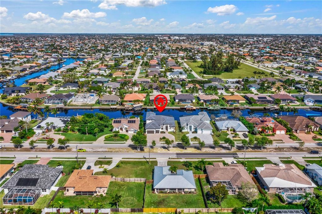 Photo of 2133 Cape Coral Parkway W, Cape Coral, FL 33914 (MLS # A4626826)