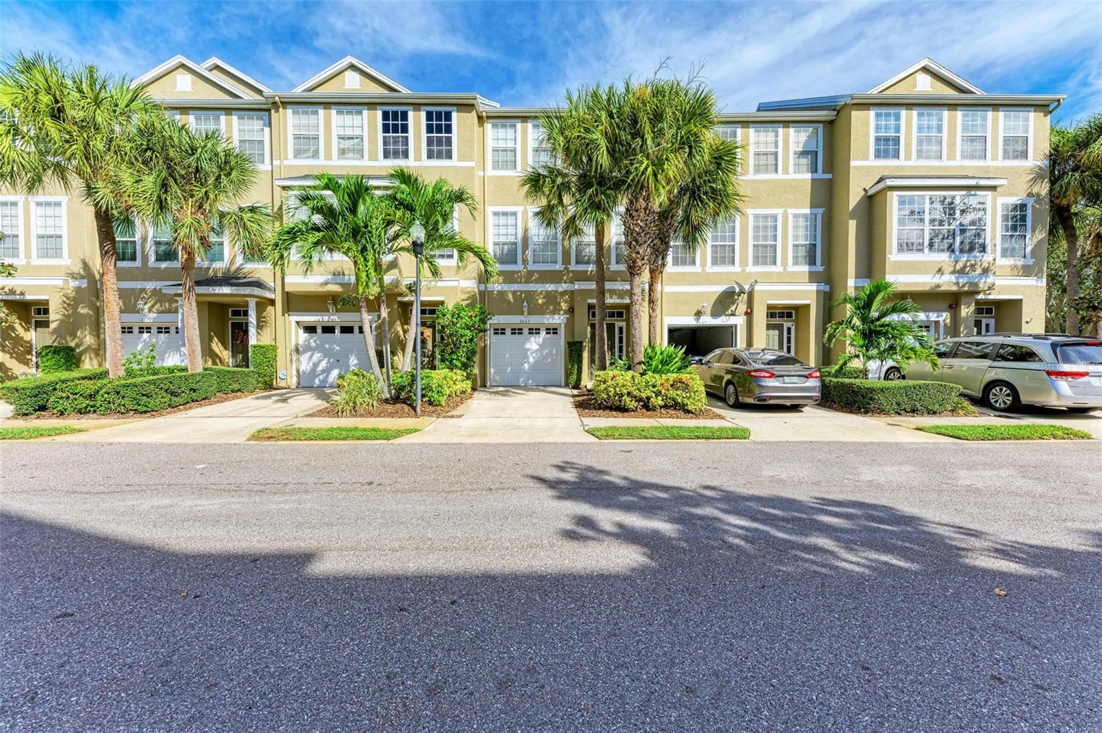 Welcome to Bayshore Pointe Townhomes—where modern style meets a prime Tampa location! This updated three-bedroom townhouse features 2.5 bathrooms, plenty of natural light, and a one-car garage with overhead storage. Located in a secure gated community just minutes from MacDill Air Force Base, Soho, Channelside, downtown Tampa, and beautiful beaches, this home offers both comfort and convenience.
The first floor boasts a flexible space that can be used as an office, loft, fitness room, or bedroom, and opens onto a screened lanai—perfect for relaxing or entertaining. Upstairs, you’ll find a modern kitchen, tasteful finishes, and a second-floor balcony with direct views of the tennis and basketball courts. The primary suite includes a private bath with double vanities and a garden tub/shower combo, while the open living and dining areas provide a great flow for everyday living.
With resort-style amenities including a pool, tennis court, and a private pier with access to Tampa Bay, this home truly has it all. Great properties do not last long—schedule your private showing today!