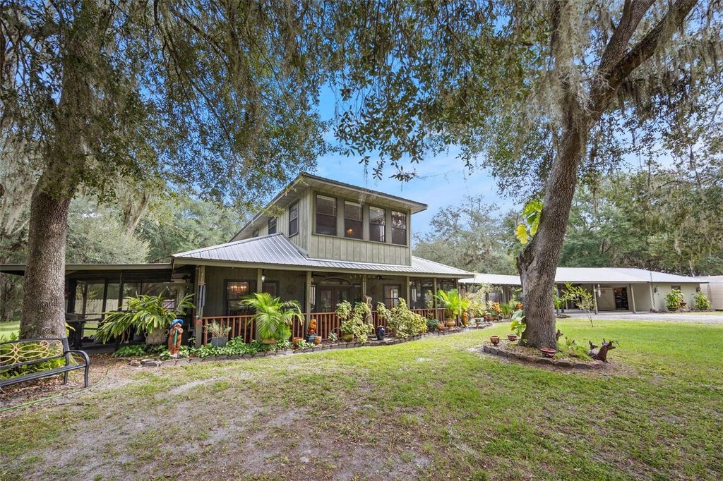 Photo of 3140 SE 23rd Place, Summerville, FL 33585 (MLS # G5103562)