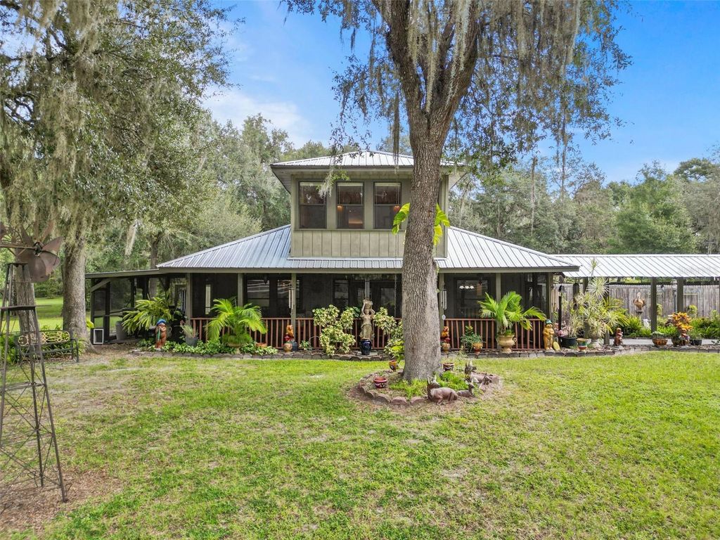Photo of 3140 SE 23rd Place, Summerville, FL 33585 (MLS # G5103562)