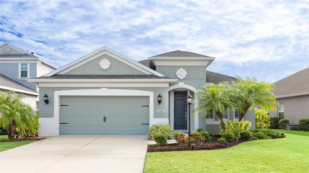 Photo of 11021 Blue Magnolia Lane, Parrish, FL 34219 (MLS # A4674688)