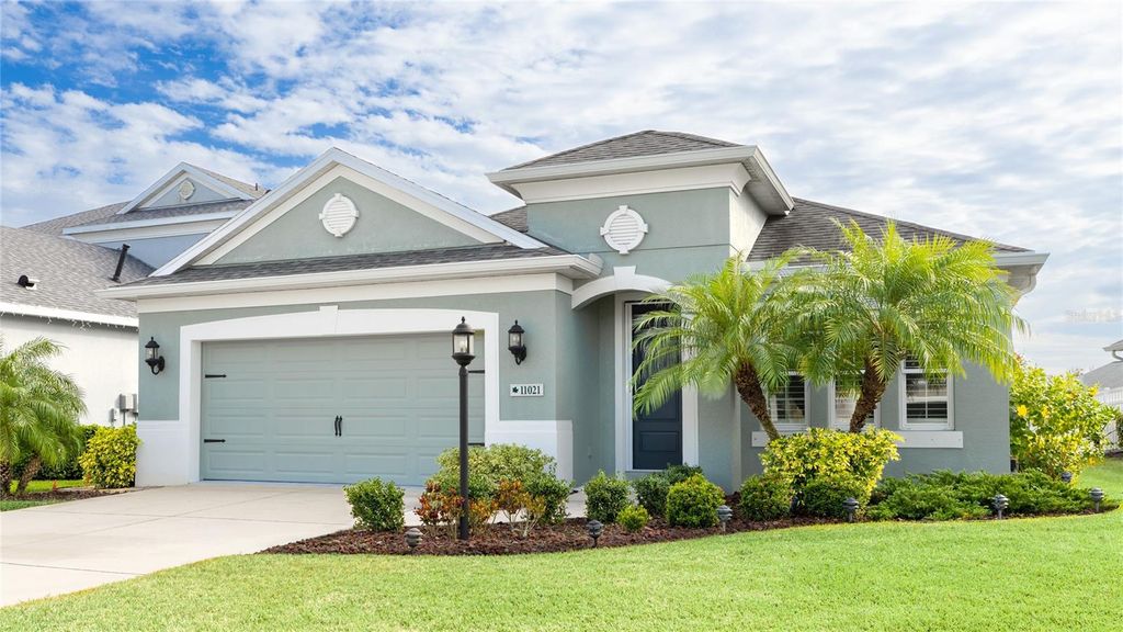 Photo of 11021 Blue Magnolia Lane, Parrish, FL 34219 (MLS # A4674688)