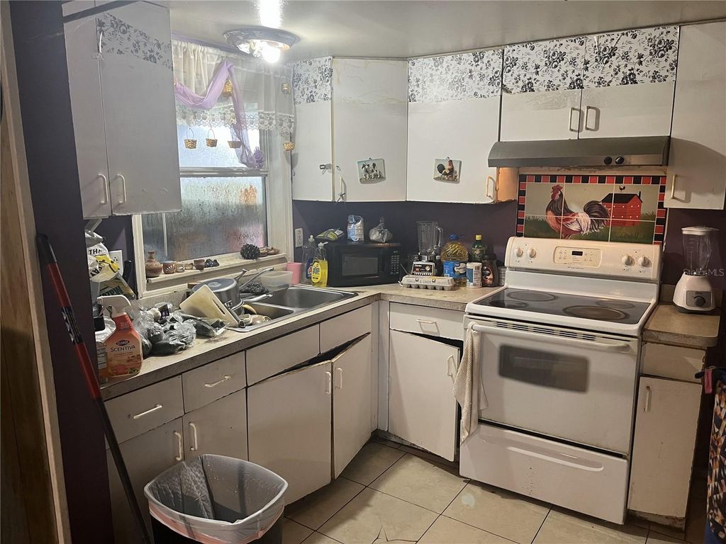 Photo of 1127 Auburn Street, Clearwater, FL 33756 (MLS # TB8521632)