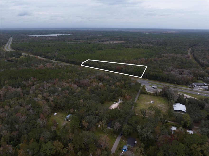 Great commercial lot in Micanopy with over 1400' of frontage right on US 441 with 13.56 acres. Currently zoned C-2/R-2. Property has been recently surveyed. Great development opportunity.
