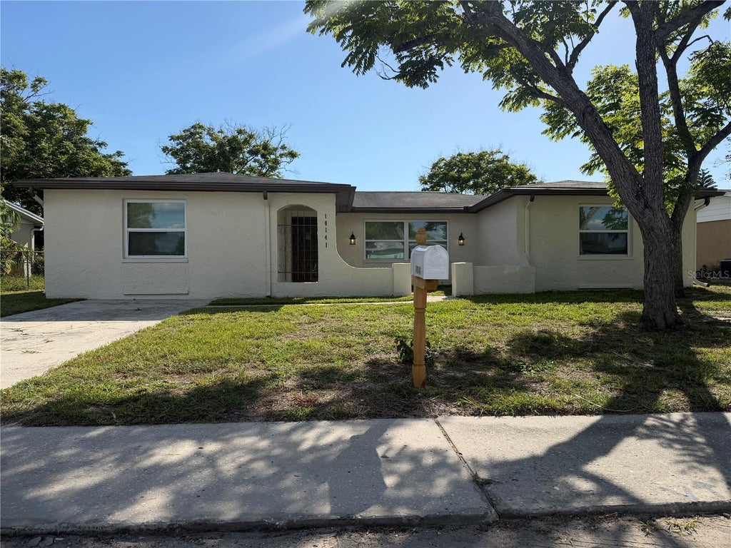 Photo of 10141 Old Hickory Lane, Port Richey, FL 34668 (MLS # TB8517258)