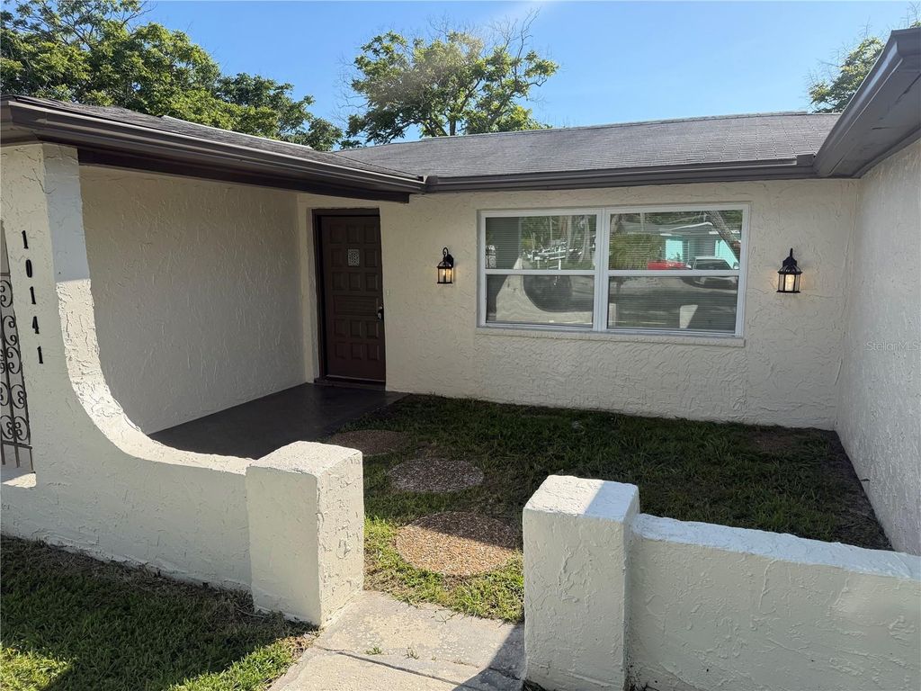 Photo of 10141 Old Hickory Lane, Port Richey, FL 34668 (MLS # TB8517258)