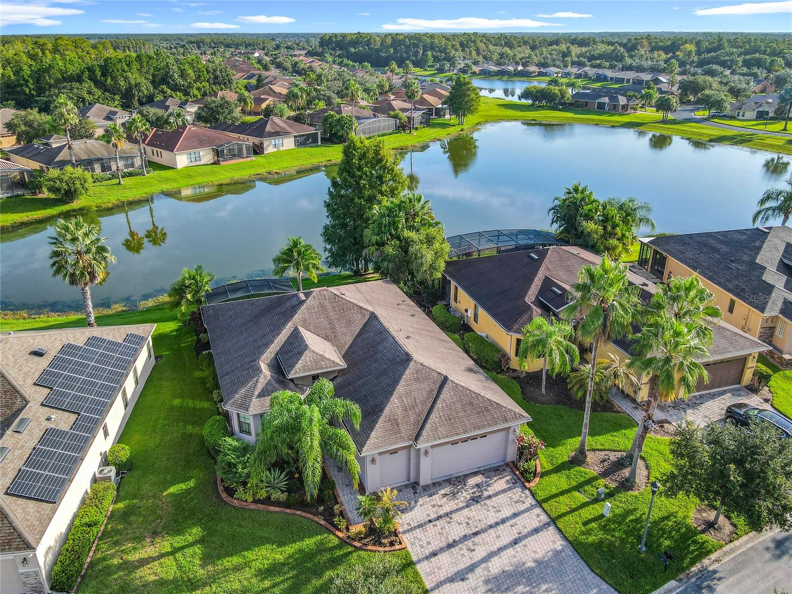 ***Water View Paradise*** Step into resort-style living with this breathtaking WATER VIEW BOCA RATON model home, perfectly positioned to capture tranquil pond views. This move-in ready home offers the ideal balance of comfort and serenity, making every day feel like a getaway. Located just moments from The Palms Amenity Center, you will enjoy access to a luxurious pool, cutting-edge fitness center, professional business hub, and courts for both tennis and pickleball. This is more than a home, it is the lifestyle you have been waiting for. This spacious open-layout home is packed with valuable upgrades, including:
***New HVAC (2024)***Roof (2017)***Water Heater (2019)***Bonus Room for added flexibility***Golf Cart Garage***. Step outside to your extended outdoor oasis, covered, and re-screened lanai (20x21), updated in 2017 and finished with elegant tile flooring. It is the perfect space to unwind, entertain, or fire up the grill in your dedicated BBQ area. Whether you are sipping morning coffee, diving into an enjoyable book, or enjoying peaceful meditation, your screened lanai offers a private retreat with charm and comfort.
This beautifully crafted Boca Raton model offers 2,211 square feet of interior living space within a total footprint of 3,137 square feet. Featuring TWO spacious bedrooms, FLEX ROOM AND BONUS ROOM. This home is adorned with diagonal tile flooring and crown molding throughout, adding a touch of sophistication. The expansive WATER-VIEW GREAT ROOM (26x19) highlights a split-floor plan, thoughtfully designed for both relaxation and entertainment. Whether you are hosting guests or enjoying quiet moments, this inviting space is perfect for sharing laughter, stories, and meaningful connections. Start each day with serene WATER VIEW views right from the comfort of your OWNER’S SUITE (22 X 16). This elegant retreat features a spacious walk-in closet and a luxurious en-suite bathroom, complete with: Walk-in shower, Double vanity with Corian countertops and private water closet for added convenience. Designed for both relaxation and functionality, this suite offers the perfect blend of style and tranquility. Enjoy cooking and entertaining in a spacious OPEN DESIGN KITCHEN designed for both style and convenience. Features include Corian countertops, Elevated breakfast bar and center island, 42” solid wood cabinets with pull-out drawers, Stylish backsplash, rounded corners, and a cozy breakfast nook. Additional highlights include an indoor laundry room with built-in cabinetry, plus a TWO-CAR GARAGE with dedicated GOLF CART SPACE, perfect for storage and easy access. This home truly has it all, move-in ready, and waiting for you to embrace the lifestyle you deserve. Solivita is a gated golf community featuring two PGA Championship 18-hole golf courses, two state-of-the-art amenity centers, 14 swimming pools, restaurants, a tennis court, playground, dog park, and over 200 clubs. It is conveniently located near supermarkets, restaurants, pharmacies, a hospital, a new expressway, and is just 25 minutes from major attractions, including the new SunRail Poinciana Station. Schedule your video virtual tour or contact me for a private showing.