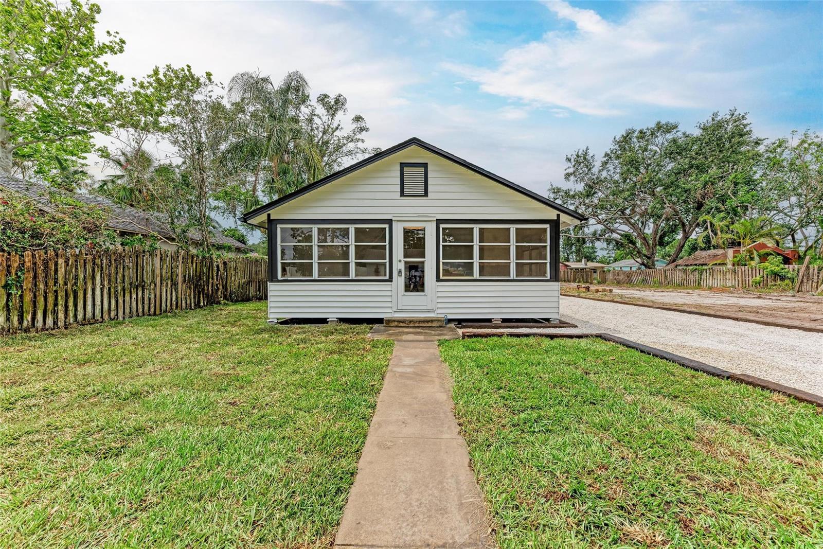 What’s old is charmingly new again in this fully renovated 1930s bungalow! This beauty blends timeless character with fresh, modern upgrades—every inch has been thoughtfully reimagined. From the moment you step inside, the original charm is undeniable, but you'll also notice the brand-new roof, all new electrical, plumbing, and HVAC, plus luxe finishes throughout.
The heart of the home? A stunning, brand-new kitchen complete with new appliances, custom cabinetry, and a sleek wine bar—perfect for entertaining or unwinding after a long day. Every room features airy shiplap ceilings for that signature bungalow character, while the master suite is a private retreat with its own French doors leading to the backyard, plus a jaw-dropping en suite with double vanity and designer finishes.
Step outside and imagine summer evenings under your brand-new gazebo—whether it becomes your dream outdoor kitchen or a quiet hammock hideaway, the possibilities are endless.
This home is as functional as it is beautiful, offering historic charm without the headaches. Come see how effortlessly old-world style meets modern comfort—you just might fall in love.