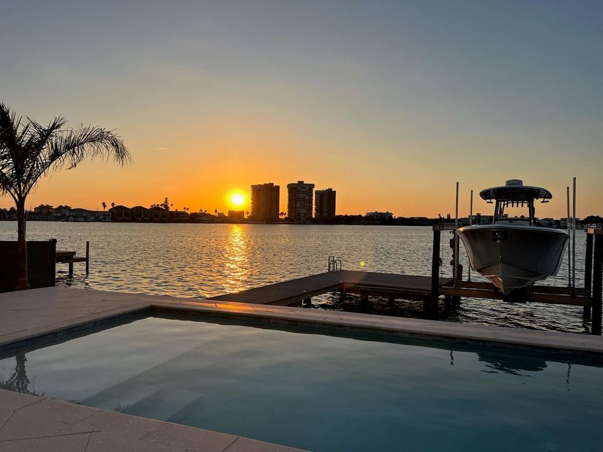 This stunning waterfront home is truly a dream come true for those seeking a lavish lifestyle. From the moment you arrive, you'll be impressed by the impeccable landscaping that perfectly suits the Florida climate. As you step inside, you'll find a convenient elevator that makes everyday living a breeze. Boasting over 3,800 square feet of living and entertaining space, this residence is both spacious and private, with 4 bedrooms and 4.5 bathrooms.

The formal living areas are tastefully designed with luxurious attention to detail, showcasing the true elegance of this home. The Family room, kitchen, and dining room offer breathtaking views of the Florida waterfront, making every moment spent in this home feel like a true escape. Imagine cooking dinner in your state-of-the-art kitchen while watching the beautiful sunset every night. Moving over you have the primary retreat, where you'll find a sumptuous sanctuary complete with stunning views and a balcony overlooking the Gulf. The exquisite bathroom features double vanities and a tiled shower with a glass door.

As you step outside, you'll find a beautiful pool with plenty of space to relax and soak up the sun. The dock is the perfect spot to sit and watch dolphins play in the water, making this home an absolute paradise. Don't miss out on the opportunity to experience the ultimate in waterfront living. Make an appointment to see this incredible home today!