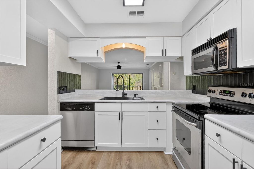 Photo of 10167 Sailwinds Boulevard N #206, Largo, FL 33773 (MLS # TB8484935)